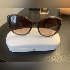 Swarovski sunglasses.